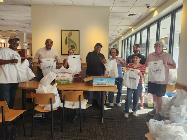 Volunteers with bags ready for the golf tournament at COMEC’s 2026 golf tournament