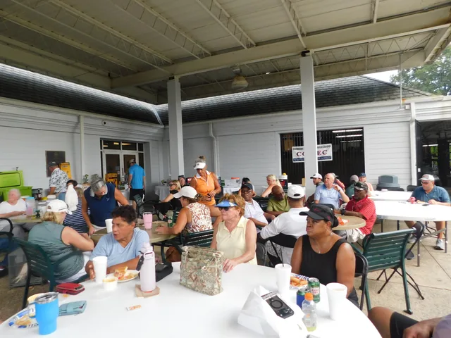 Participants gathering for lunch at the clubhouse at COMEC’s 2026 golf tournament